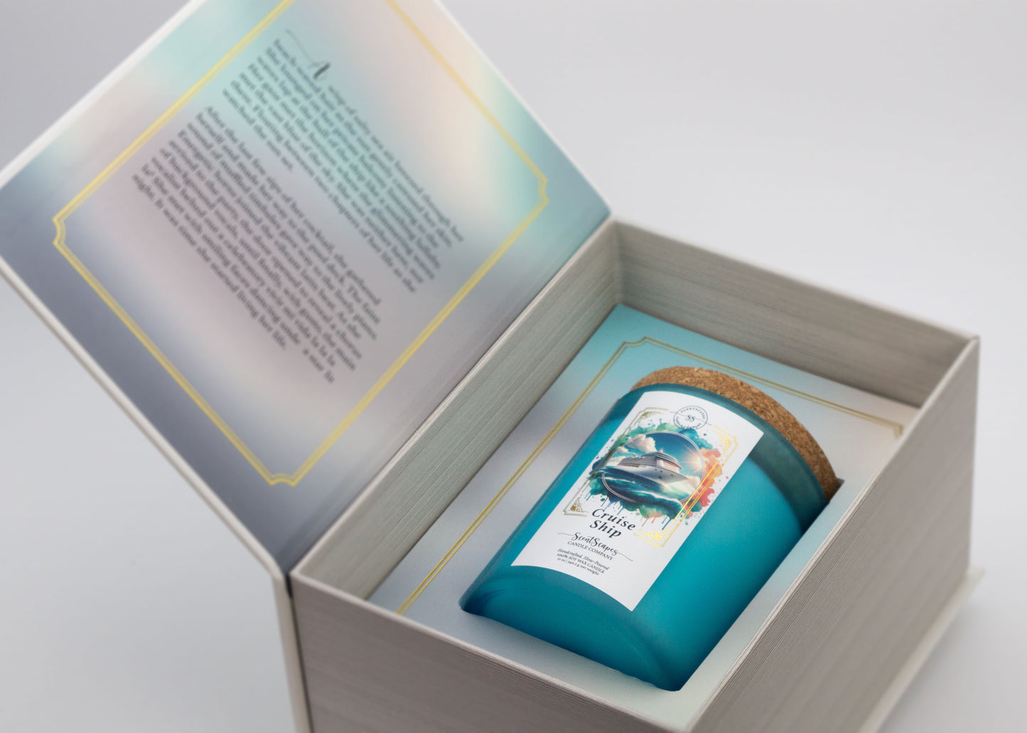 A ScentScapes candle in a blue jar with cork lid, labeled 'Cruise Ship, depicting an illustration of a cruise ship on the ocean. The candle is displayed inside its storybook box packaging. Unboxing image reveals short story on inside cover that goes along with the scent.